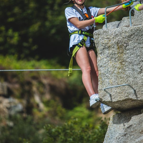 Climbing-teen-girl-hanging-portrait.jpeg