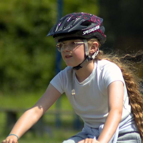 Girl Cycling.png