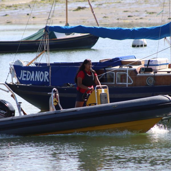 Instructor driving Powerboat