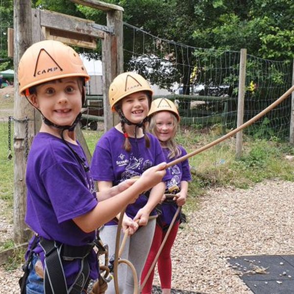 Beavers smiling whilst belaying.jpeg